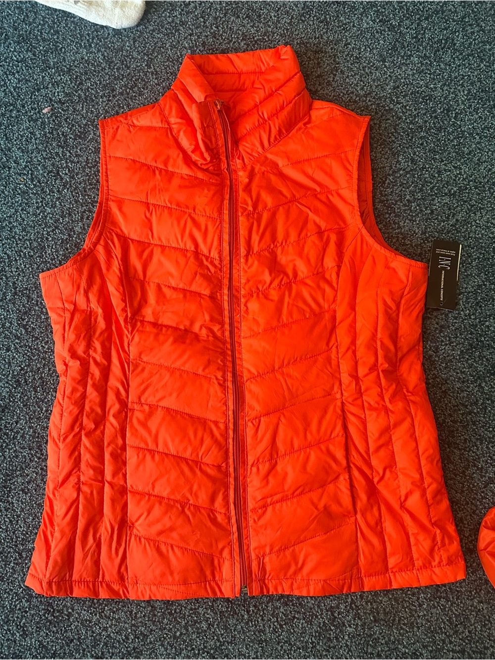 iINC International Concepts Orange nwt vest pockets travel bag $125
